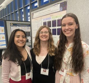 Angela, Molly, and Allison viewing posters at the Midwest Islet Club conference.